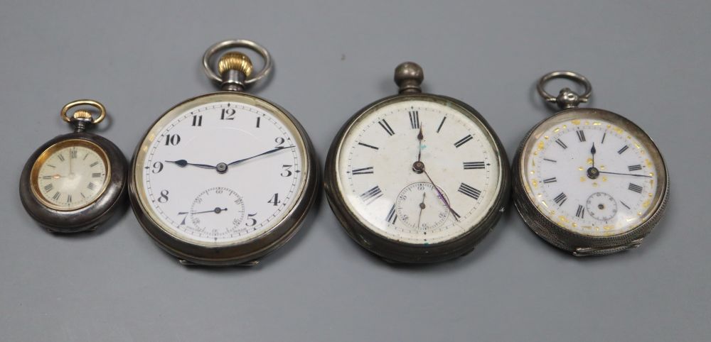 Three assorted white metal pocket watches and a fob watch.